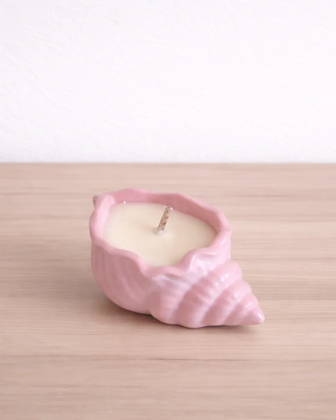 Vela aromática en forma de caracola