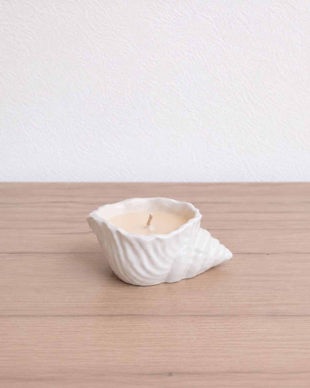 Vela aromática en forma de caracola